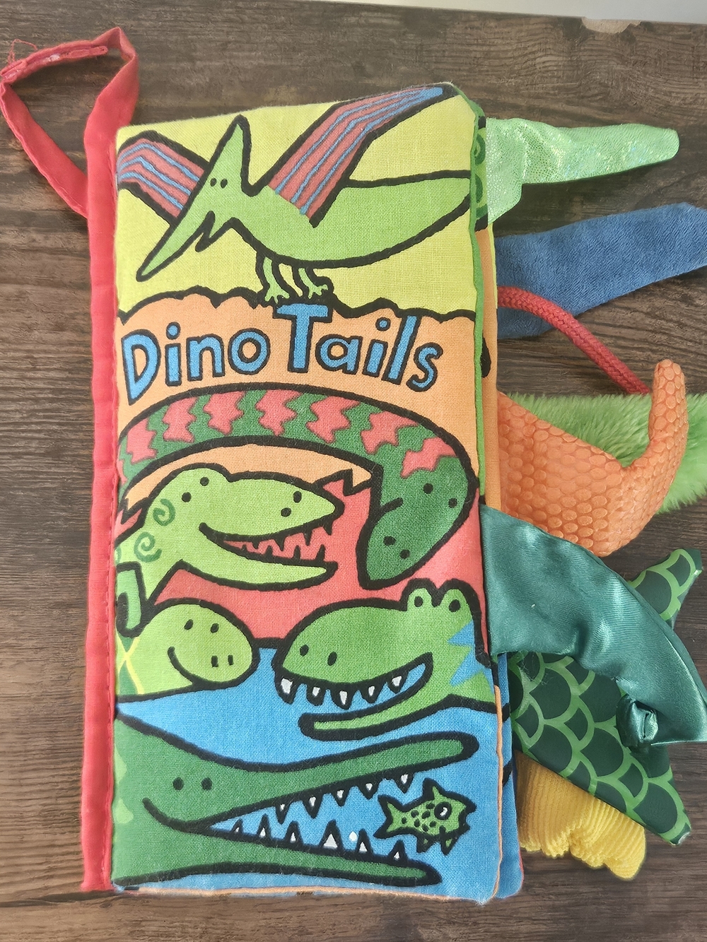 Jellycat Dino Tails Plush Activity Book - Green, Orange, Blue, Pink